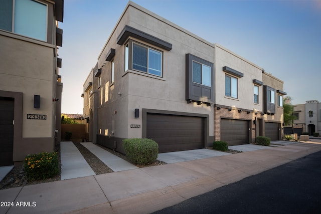 view of front of property with a garage