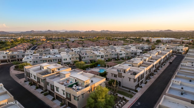 aerial view at dusk with a mountain view