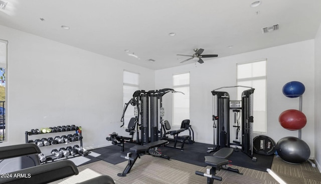 exercise area with ceiling fan