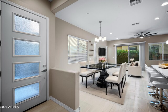 dining space with ceiling fan