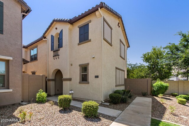 8313 E Impala Ave, Mesa, AZ 85209 - view of front of house with stucco siding and a tiled roof