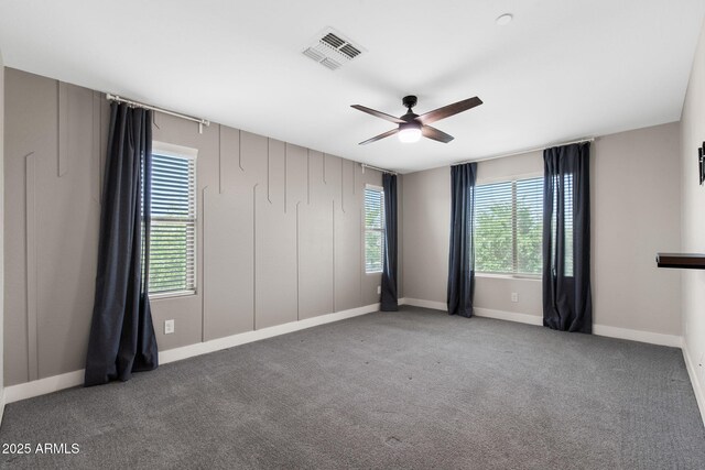 8313 E Impala Ave, Mesa, AZ 85209 - carpeted spare room featuring ceiling fan and baseboards