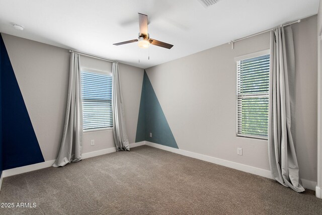 8313 E Impala Ave, Mesa, AZ 85209 - empty room featuring ceiling fan, carpet, and baseboards