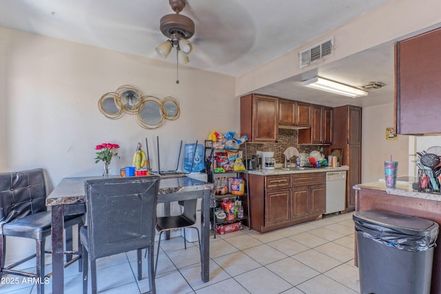 860 E Brown Rd Unit 25, Mesa, AZ 85203 - kitchen with ceiling fan, dishwasher, light countertops, tasteful backsplash, and light tile patterned flooring