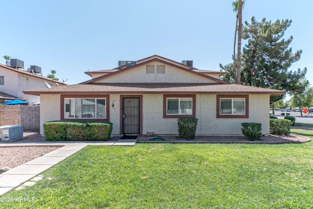 860 E Brown Rd Unit 25, Mesa, AZ 85203 - bungalow featuring roof with shingles and stucco siding