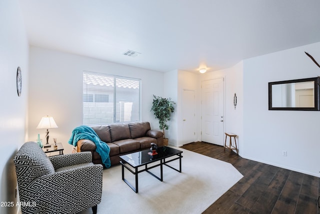 living room featuring dark hardwood / wood-style floors