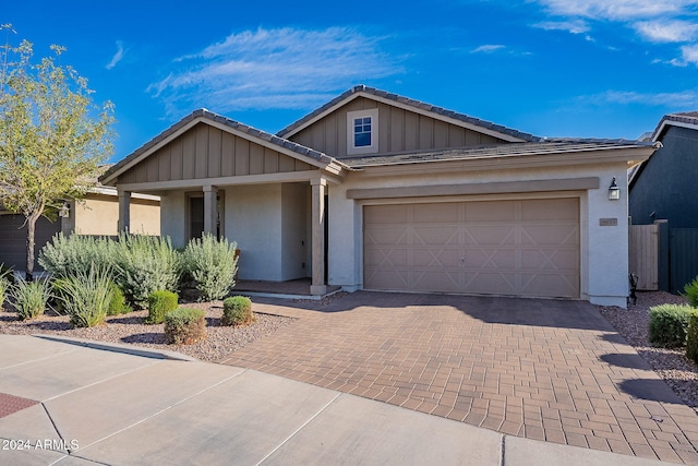 view of front of property with a garage