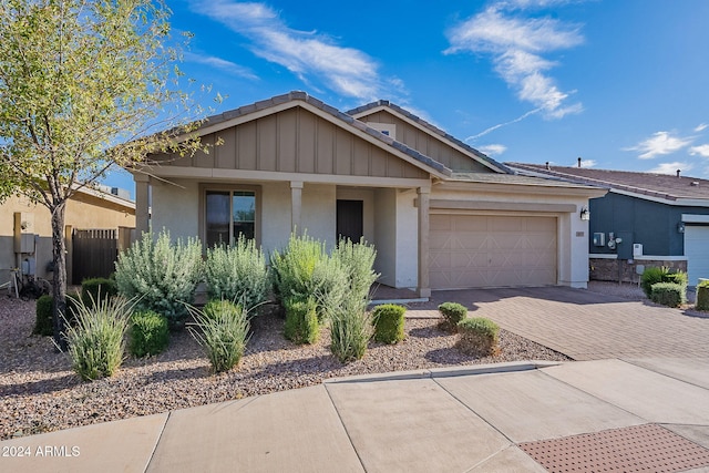 view of front of property with a garage