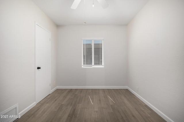 1628 E Sunland Ave, Phoenix, AZ 85040 - spare room featuring wood finished floors, baseboards, and a ceiling fan