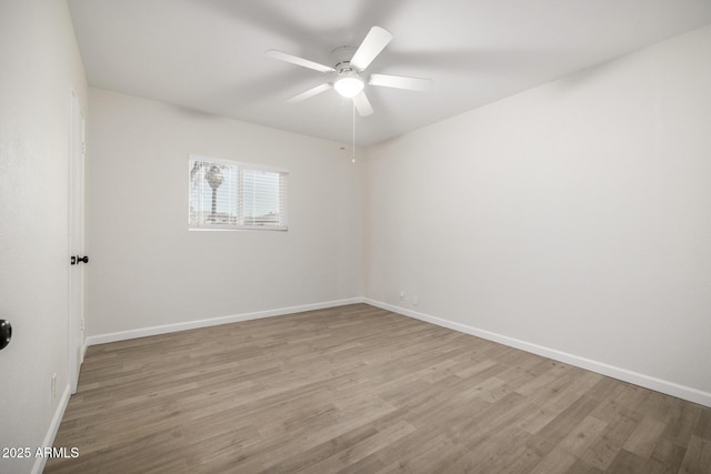 1628 E Sunland Ave, Phoenix, AZ 85040 - unfurnished room featuring ceiling fan, wood finished floors, and baseboards