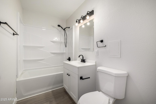 1628 E Sunland Ave, Phoenix, AZ 85040 - full bathroom with toilet, vanity, shower / tub combination, and wood finished floors