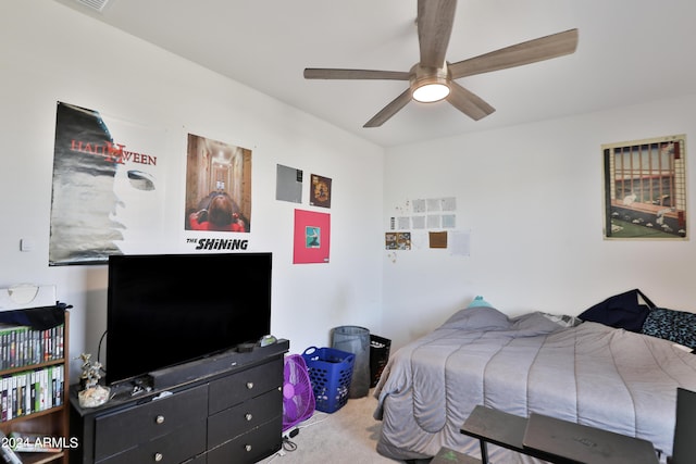 carpeted bedroom with a ceiling fan