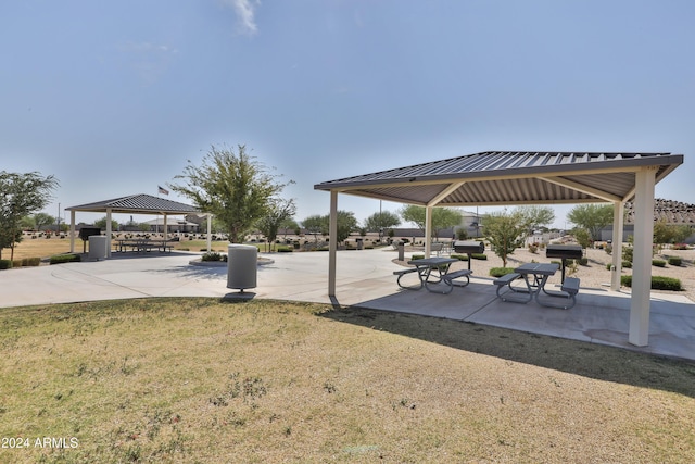 view of home's community with a gazebo and a lawn