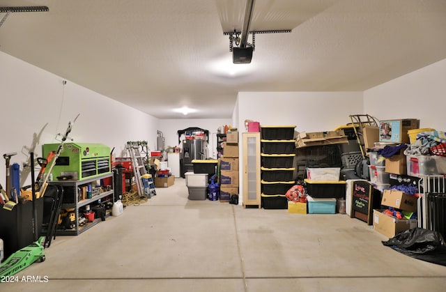 garage featuring a garage door opener