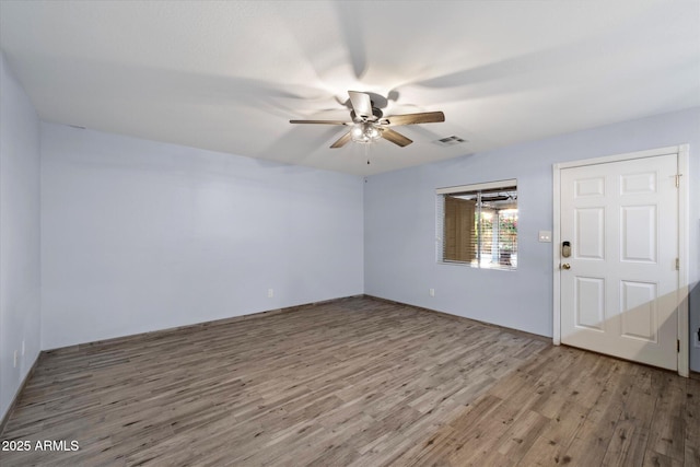 2726 W Meseto Cir, Mesa, AZ 85202 - spare room with wood finished floors and ceiling fan
