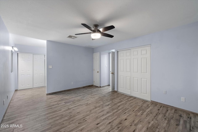 2726 W Meseto Cir, Mesa, AZ 85202 - unfurnished bedroom with wood finished floors and ceiling fan