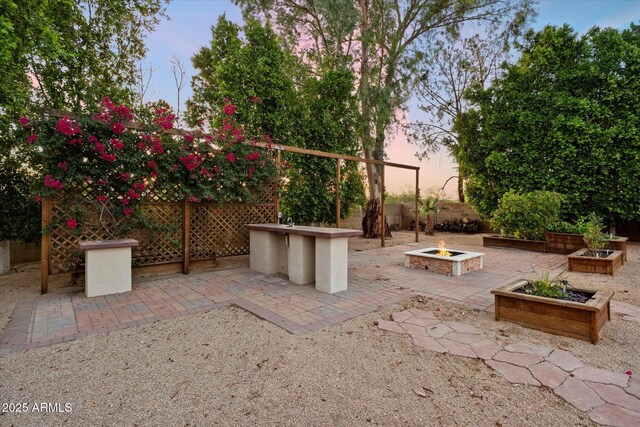 2726 W Meseto Cir, Mesa, AZ 85202 - view of patio / terrace featuring an outdoor fire pit