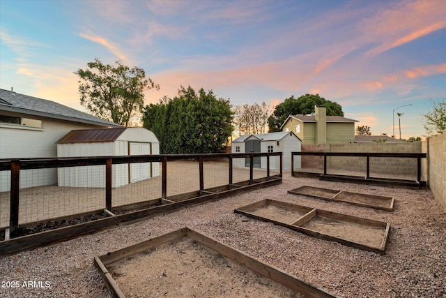 2726 W Meseto Cir, Mesa, AZ 85202 - fenced backyard featuring a storage shed and a vegetable garden