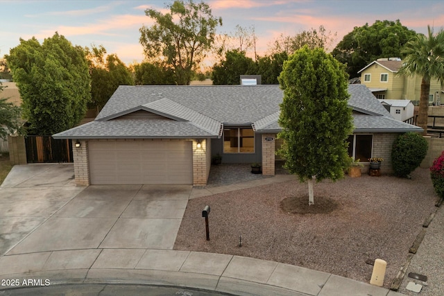 2726 W Meseto Cir, Mesa, AZ 85202 - view of front of property featuring a shingled roof, driveway, a garage, and brick siding