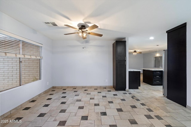 2726 W Meseto Cir, Mesa, AZ 85202 - spare room with a ceiling fan and recessed lighting
