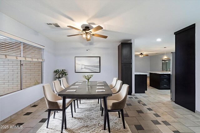 2726 W Meseto Cir, Mesa, AZ 85202 - dining room featuring a ceiling fan and recessed lighting