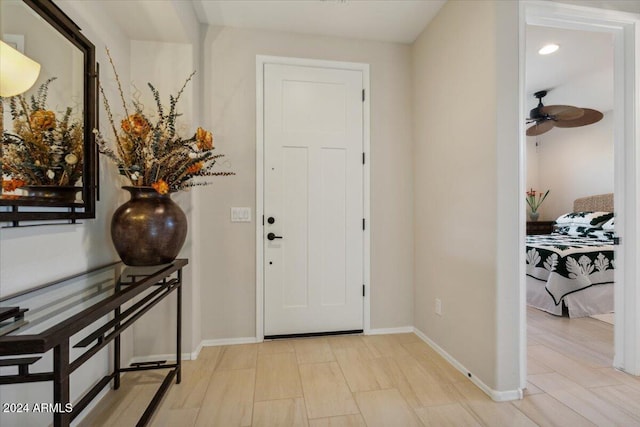 entryway with ceiling fan