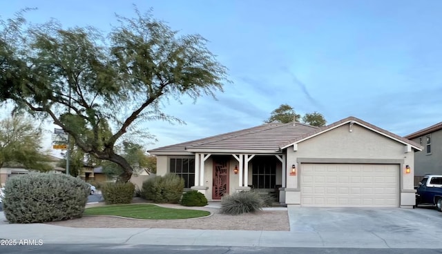 view of front of home with a garage