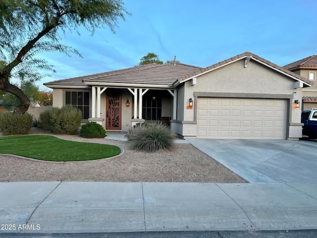 ranch-style home featuring a garage