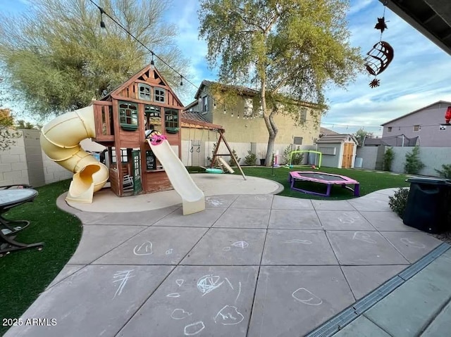 view of play area with a trampoline