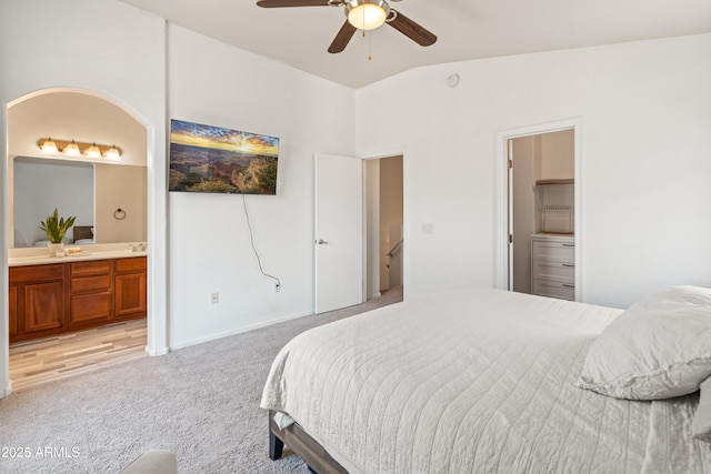 2150 E Bell Rd Unit 1088, Phoenix, AZ 85022 - bedroom featuring light colored carpet, ensuite bath, ceiling fan, and lofted ceiling