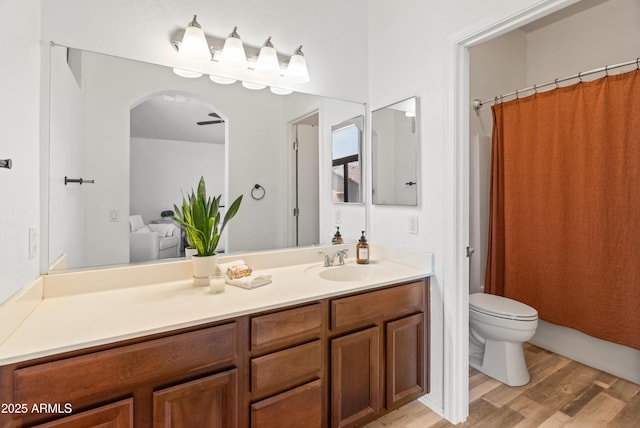 2150 E Bell Rd Unit 1088, Phoenix, AZ 85022 - full bath with wood finished floors, vanity, and a shower with shower curtain