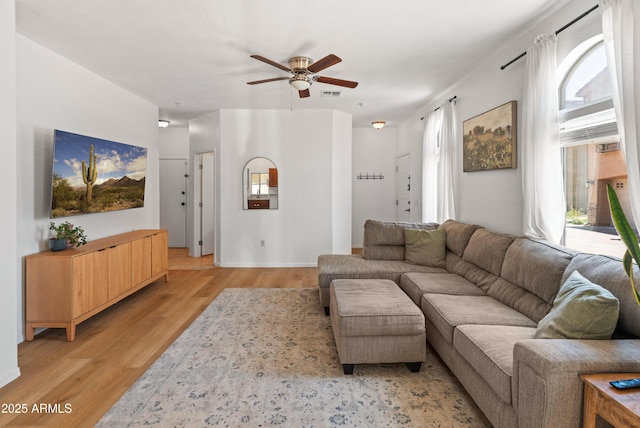 2150 E Bell Rd Unit 1088, Phoenix, AZ 85022 - living area featuring light wood-type flooring and ceiling fan