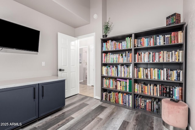 sitting room featuring wood finished floors