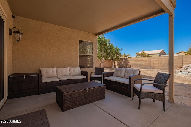 view of patio / terrace with a fenced backyard and outdoor lounge area