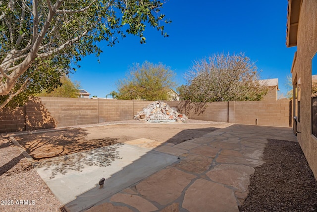 view of patio with a fenced backyard