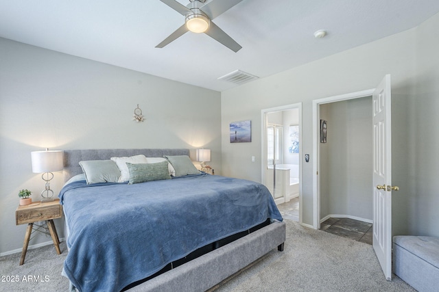 15848 W Calavar Rd, Surprise, AZ 85379 - bedroom featuring carpet floors, baseboards, ensuite bathroom, and a ceiling fan