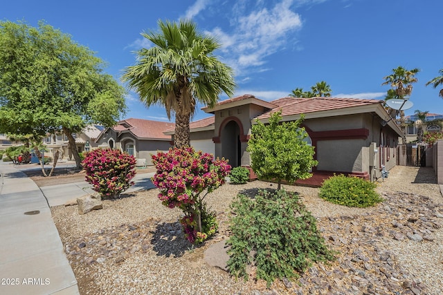 15848 W Calavar Rd, Surprise, AZ 85379 - view of front facade featuring stucco siding and a tile roof