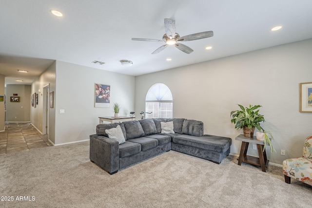 15848 W Calavar Rd, Surprise, AZ 85379 - carpeted living room featuring ceiling fan, baseboards, and recessed lighting
