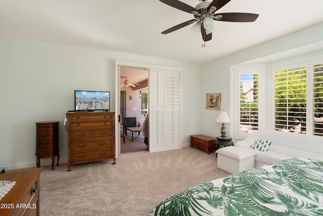 16158 W Copper Point Ln, Surprise, AZ 85374 - carpeted bedroom featuring multiple windows, baseboards, and ceiling fan