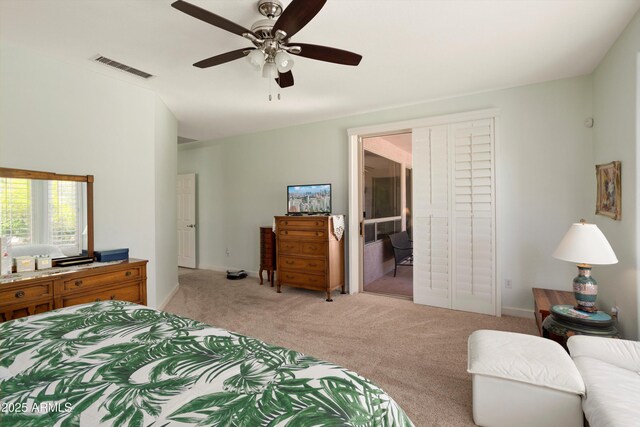 16158 W Copper Point Ln, Surprise, AZ 85374 - bedroom featuring light carpet, baseboards, and ceiling fan