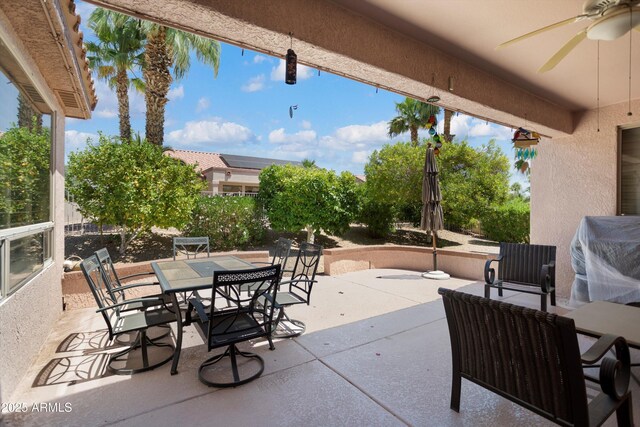 16158 W Copper Point Ln, Surprise, AZ 85374 - view of patio with outdoor dining area, ceiling fan, and a grill