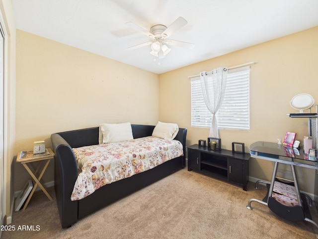 7676 W Sells Dr, Phoenix, AZ 85033 - carpeted bedroom with baseboards and a ceiling fan