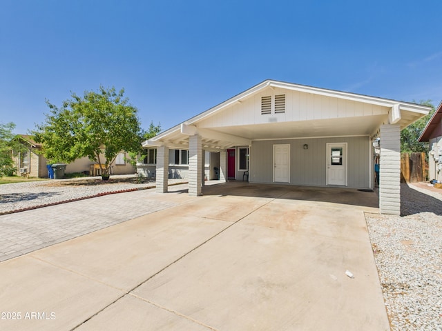 7676 W Sells Dr, Phoenix, AZ 85033 - view of front facade featuring a carport and driveway