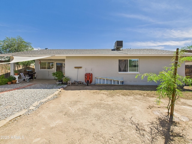 7676 W Sells Dr, Phoenix, AZ 85033 - rear view of property with a patio area, brick siding, and central air condition unit