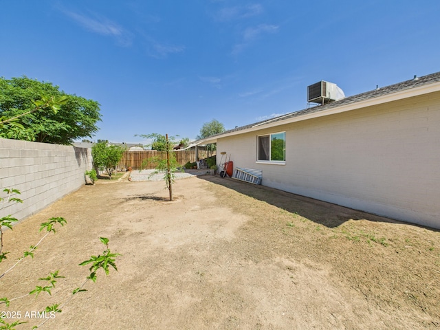 7676 W Sells Dr, Phoenix, AZ 85033 - view of yard featuring a fenced backyard and cooling unit