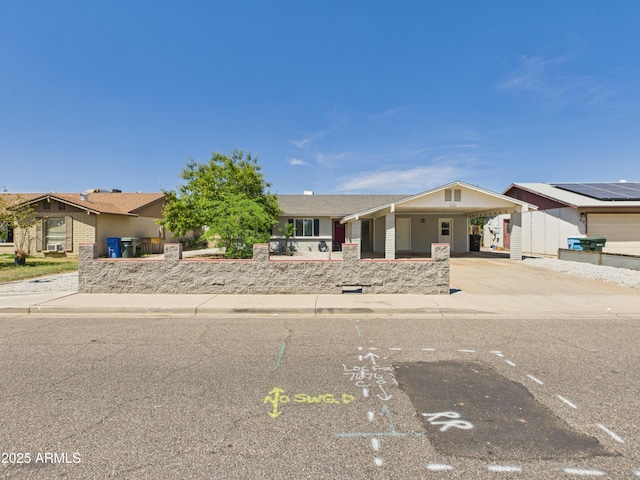 7676 W Sells Dr, Phoenix, AZ 85033 - single story home featuring driveway and an attached carport