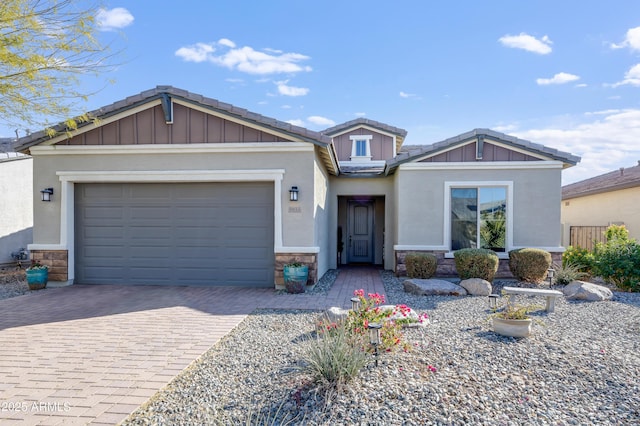 5933 N 189th Dr, Litchfield Park, AZ 85340 - view of front facade featuring a garage
