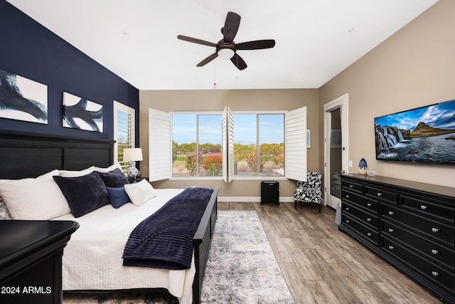 bedroom featuring ceiling fan and wood-type flooring