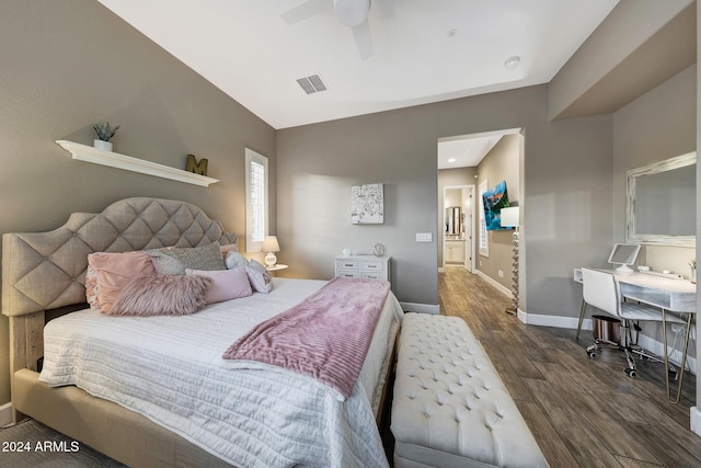 bedroom with ceiling fan and dark hardwood / wood-style floors