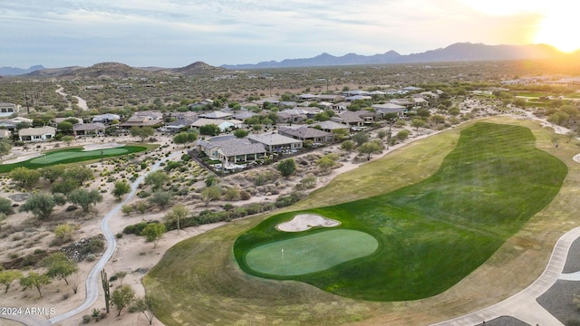 birds eye view of property with a mountain view